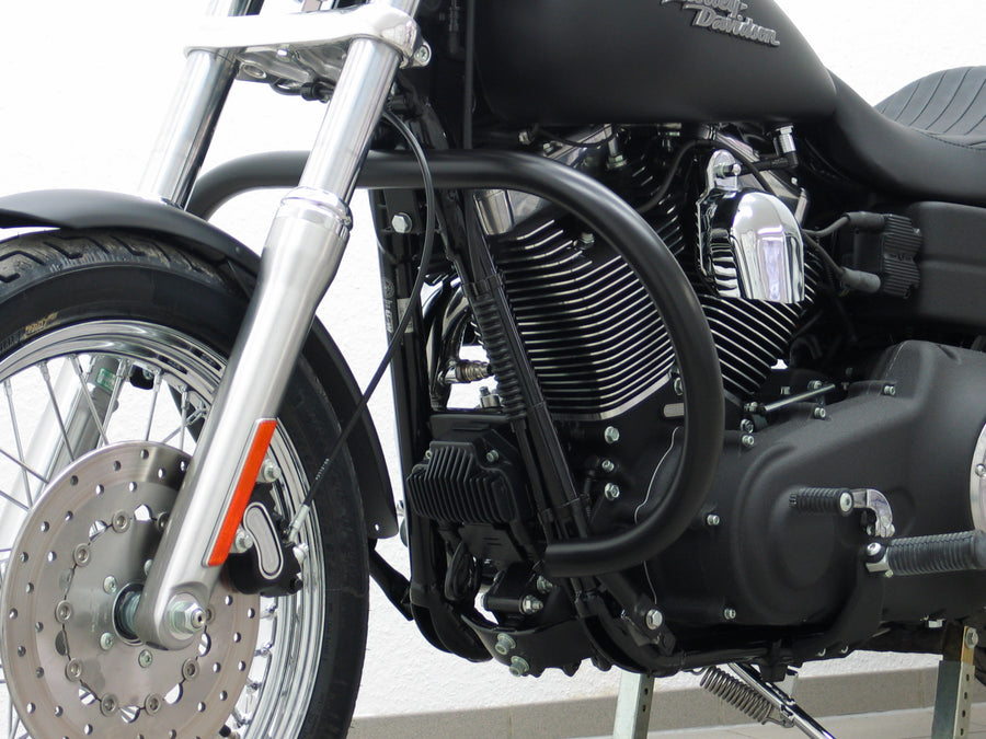 Harley Davidson Dyna Glide Low Rider [2015-2017] - Barra di protezione, versione di grandi dimensioni fatta di tubo da 38 mm, forma rotonda, nero