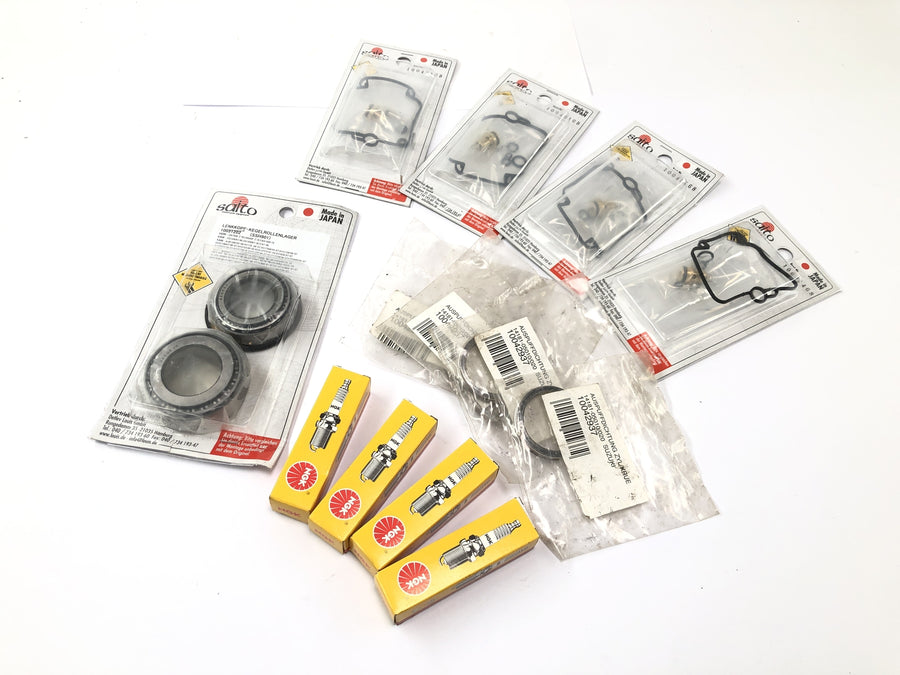 Suzuki GSX-R 1100 W GU75 C [1994] - raccolta minuteria candele set riparazione carburatore guarnizioni scarico cuscinetti