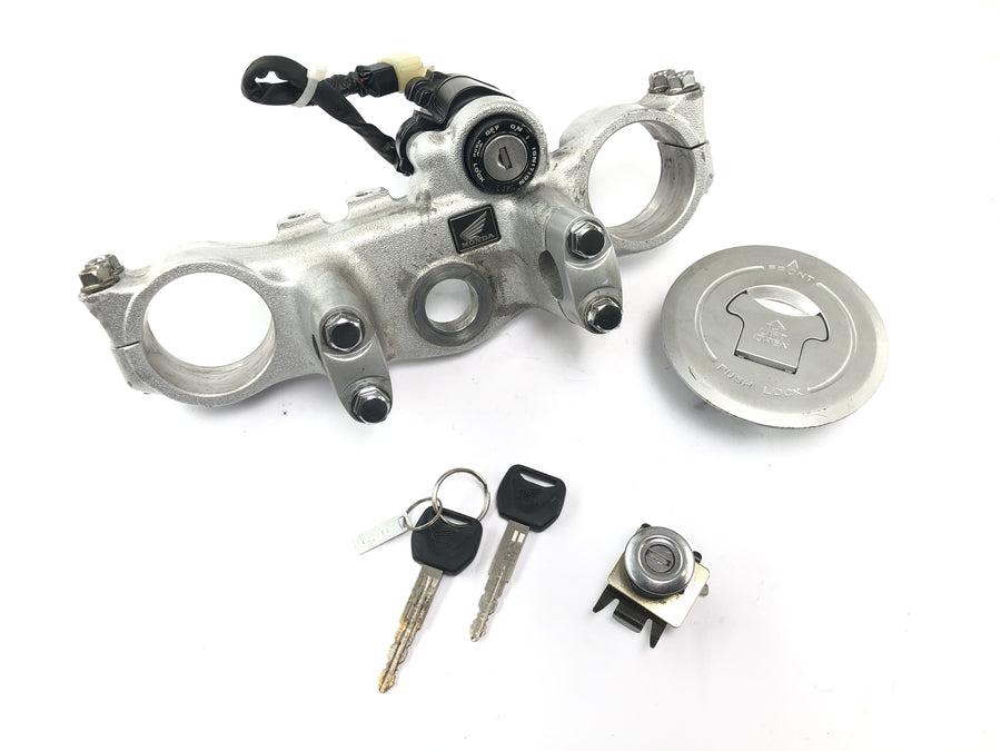 Honda FMX 650 RD12 [2006] - Set serrature, blocchetto di accensione, tappo del serbatoio, ponte forcella superiore