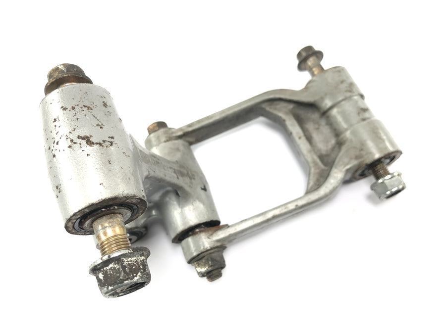 Honda FMX 650 RD12 [2006] - Leva dell'ammortizzatore per la deflessione del montante della sospensione