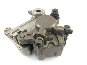 Honda NX 650 RD02 [1989] - brake caliper at the back with anchor plate - 0